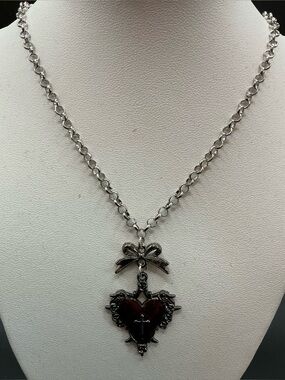 SILVERTONE CROSS IN HEART PENDANT NECKLACE WITH BOW ACCENT
